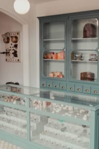Elegant retail display cabinet with invisible undermount soft-close drawers