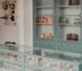 Elegant retail display cabinet with invisible undermount soft-close drawers